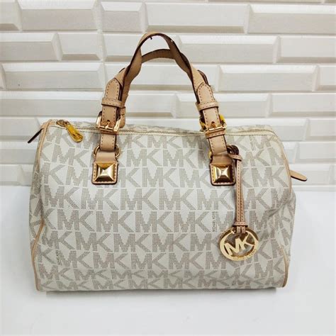 michael kors duplicate bags|Michael Kors large suitcase.